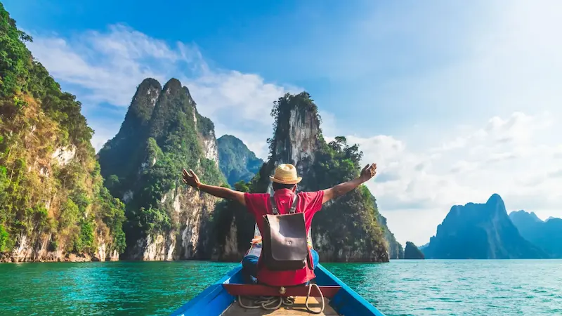 yacht
sailing on clear blue water during an
adventure holiday.